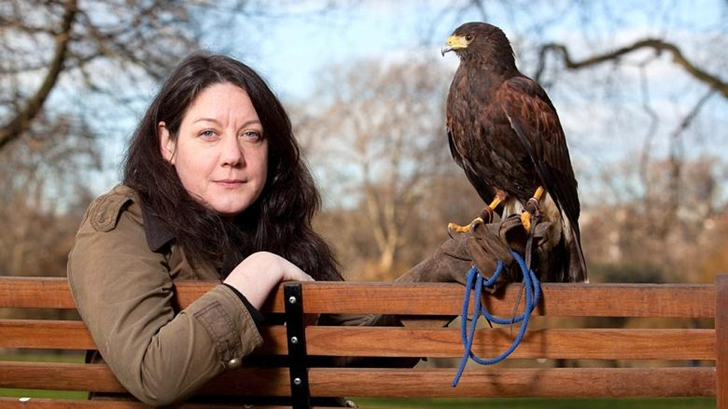 helen macdonald author photo with hawk